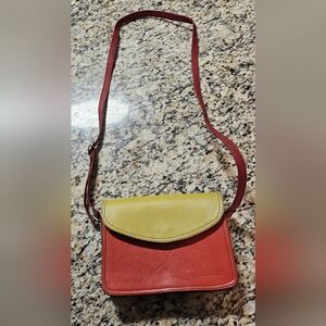 Soruka Unique recycled leather crossbody bag in a Orange and yellow-